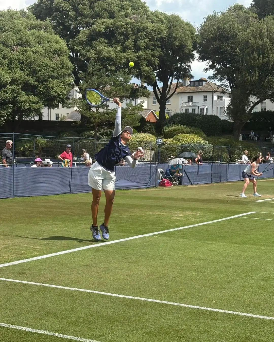 Mili Shah serving
